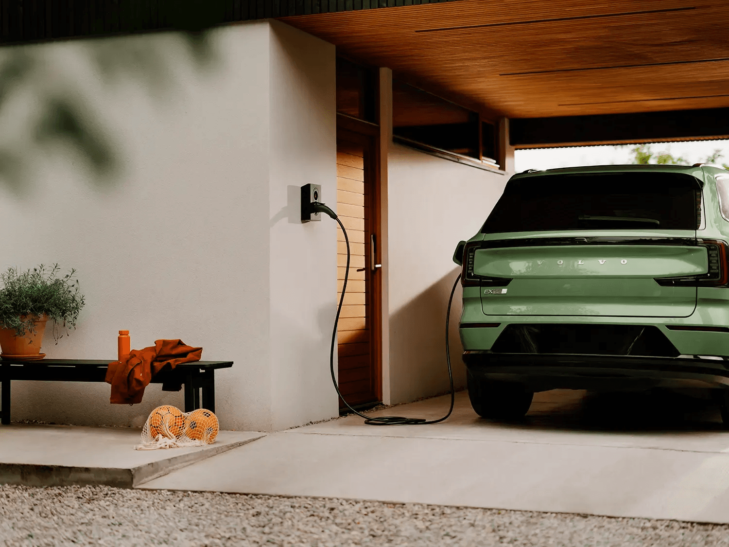 Green modern electric vehicle charging at home wallbox